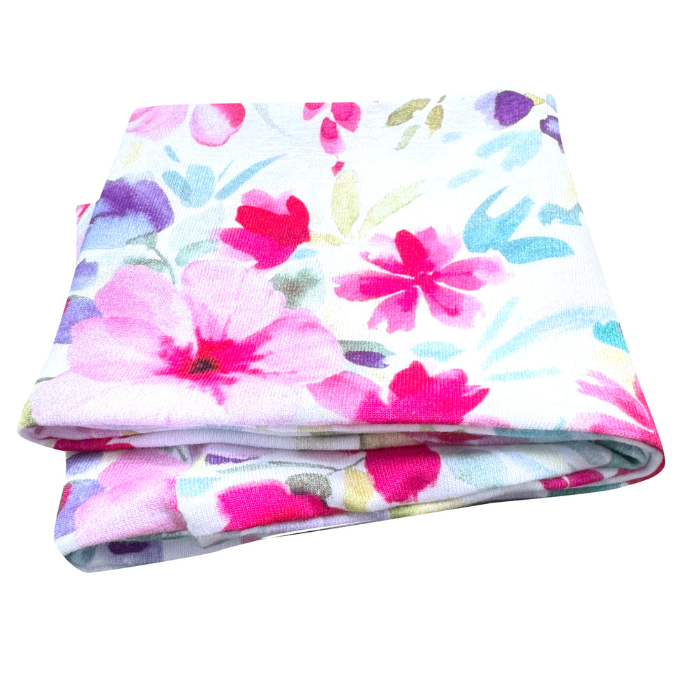 Wollhuhn Elastisches Öko Stirnband / Haarband Jersey Zweilagig Breit Blumen Pink/Bunt, gefaltet, mit floralem Muster, handgemacht aus weichem, zertifiziertem Bio-Jersey.