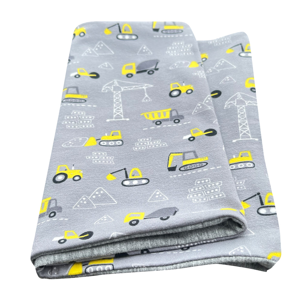 Wollhuhn Leichtes Öko Jersey Halstuch mit Bagger-Muster, handgemacht in Hellgrau und Gelb, locker und wendbar, ideal für Kinder in Übergangszeiten.