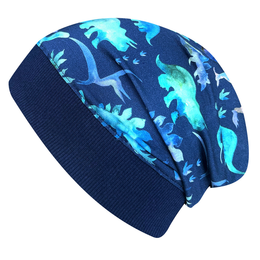 Wollhuhn Dünne Öko Beanie-Mütze Sommer/Übergang Einlagig Dinos Blau, handgemachte, bequeme Jersey-Mütze mit blauen Dinosauriermotiven, ideal für kühle Tage.