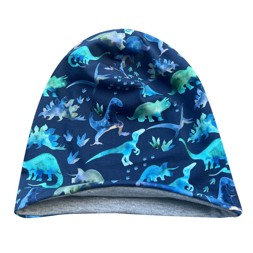 Wollhuhn Öko Long Beanie / Wendemütze, zweilagig, mit blauen Dinosauriern, ideal für Kinder, aus weichem Baumwolljersey, handgefertigt, beidseitig tragbar, komfortabel und modisch.