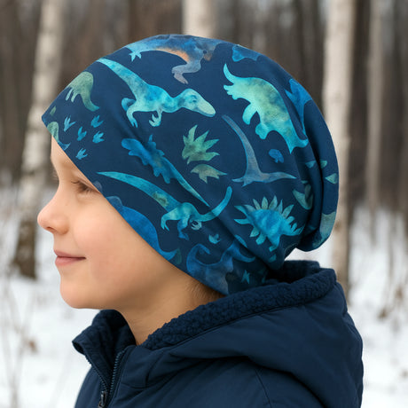 Wollhuhn Öko Long Beanie / Wendemütze, zweilagig, Dinos Blau; handgemacht, lässiger Schnitt, ideal für Kinder und Jugendliche, weich, dehnbar, perfekt für Frühling und Herbst.