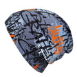 Wollhuhn Öko Shorties Wendemütze: Handgemachte Beanie mit stilvollem Graffiti-Muster, aus weichem Öko-Jersey, zweilagig für optimalen Komfort und Wärme.