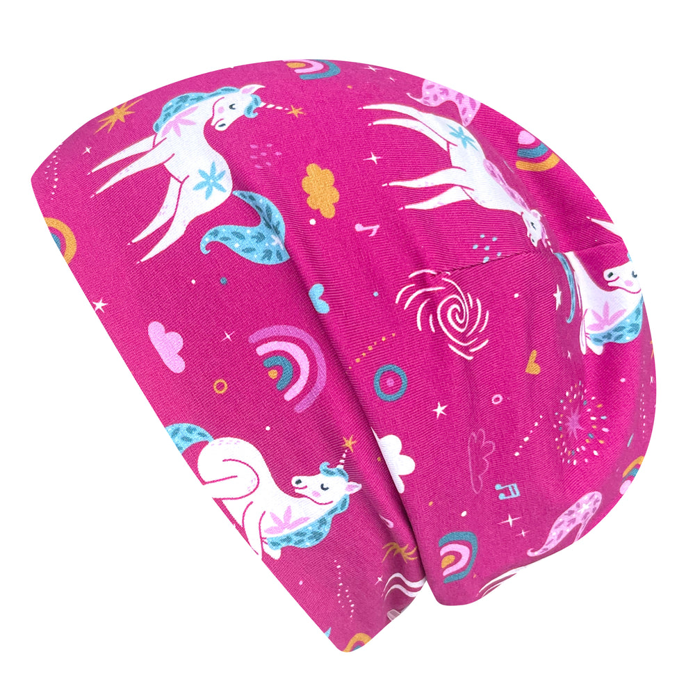 Wollhuhn Öko Shorties Wendemütze, zweilagig und handgemacht, ideal für aktive Kinder. Verkürzter Schnitt, dehnbar, bequem und unter Helmen tragbar.