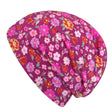Wollhuhn Öko Shorties Wendemütze: Handgemachte, zweilagige Beanie mit Blumenmuster, ideal für Kinder, aus weichem Öko-Jersey, sorgt für Stil und Komfort.