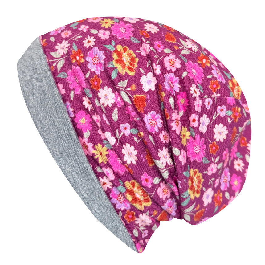 Wollhuhn Öko Long Beanie: Zweilagige, wendbare Mütze mit Blumenmuster, aus weichem Baumwolljersey, ideal für Kinder, sorgt für komfortable Wärme.