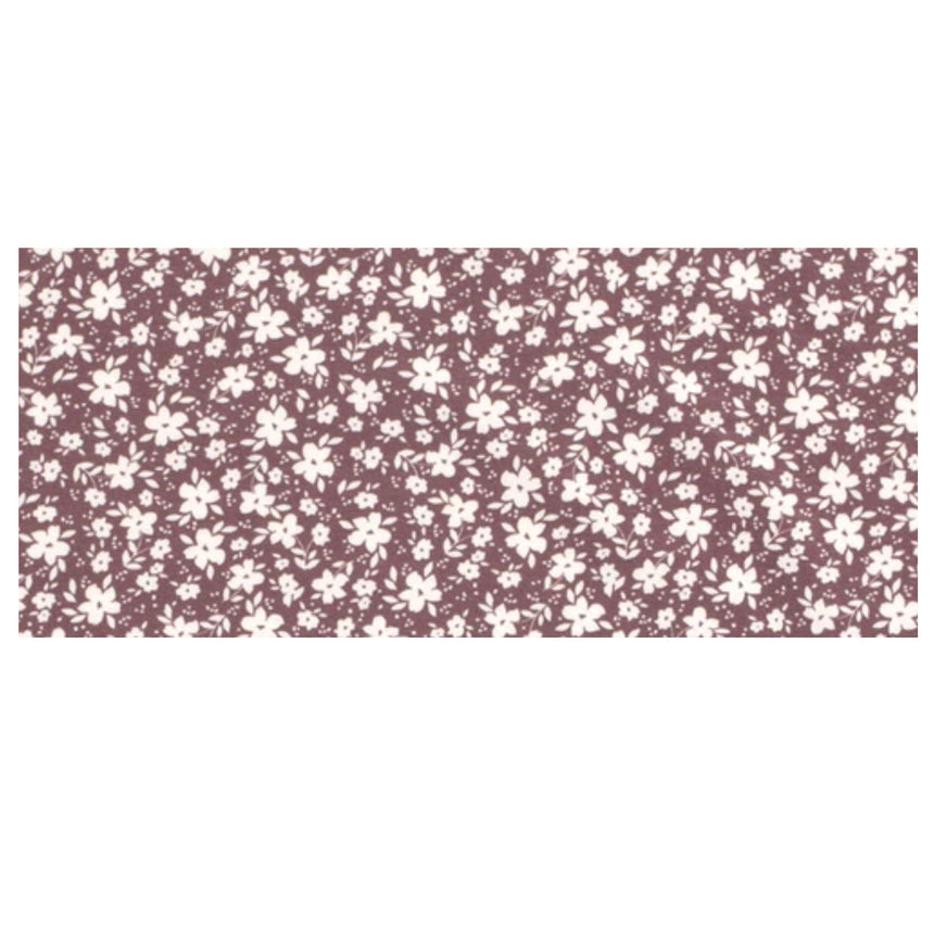 Wollhuhn Elastisches Öko Stirnband / Haarband Jersey Zweilagig Breit Blümchen Mauve zeigt ein handgefertigtes, weiches Stirnband mit floralem Muster, ideal für vielseitige Nutzung.