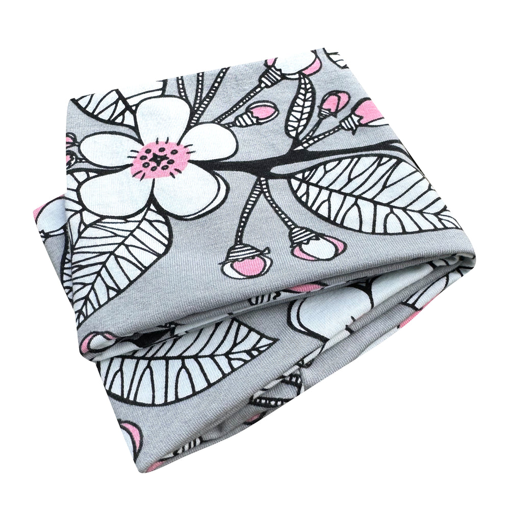 Wollhuhn Elastisches Öko Stirnband, zweilagig, mit floralem Muster, handgefertigt aus Bio-Baumwolle, ideal für Freizeit und Sport, schützt Ohren zuverlässig.