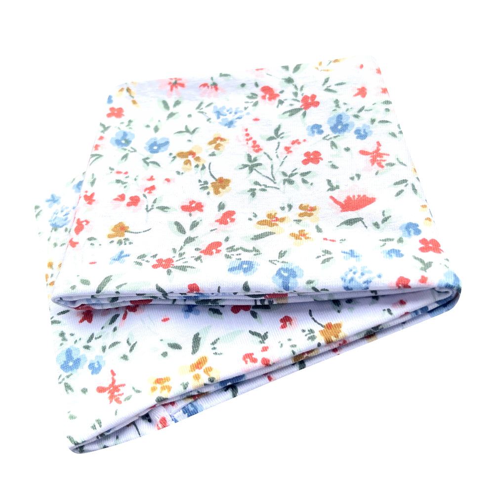 Wollhuhn Elastisches Öko Stirnband: Handgenähtes, zweilagiges Jersey-Stirnband mit buntem Blumenmuster, ideal für Kinder und Erwachsene, aus nachhaltiger Bio-Baumwolle.