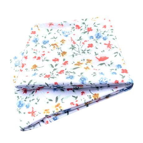 Wollhuhn Elastisches Öko Stirnband: Handgenähtes, zweilagiges Jersey-Stirnband mit buntem Blumenmuster, ideal für Kinder und Erwachsene, aus nachhaltiger Bio-Baumwolle.