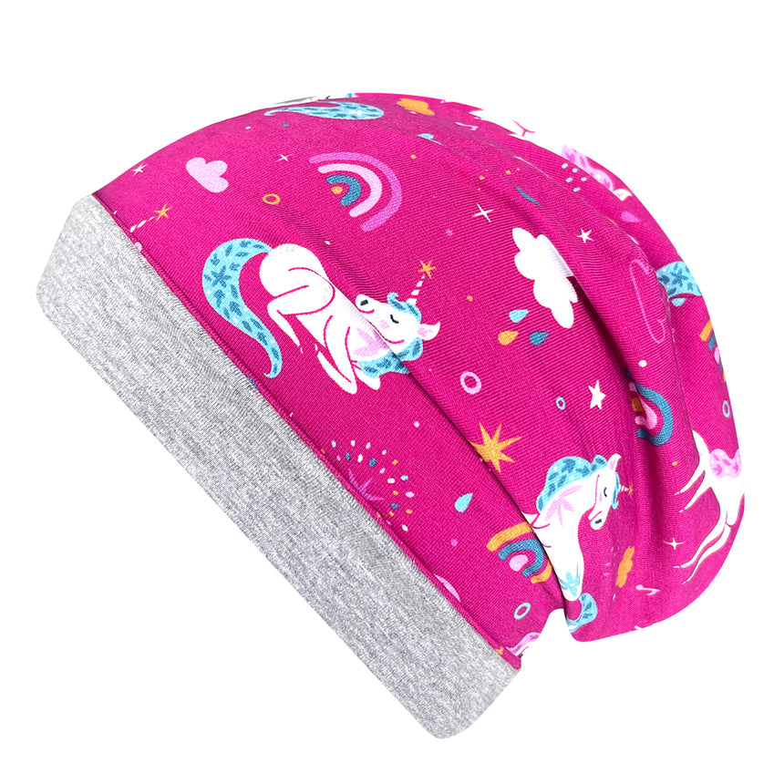 Wollhuhn Öko Long Beanie, zweilagig, mit pinkem Einhorn- und Sternenmuster, aus weichem Baumwolljersey, für Kinder und Jugendliche, wendbar und ganzjährig tragbar.