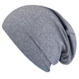 Wollhuhn Öko Long Beanie, zweilagig und wendbar, aus weichem Baumwolljersey. Handgemacht in Deutschland, ideal für ganzjährigen Tragekomfort und Kinderfreundlichkeit.