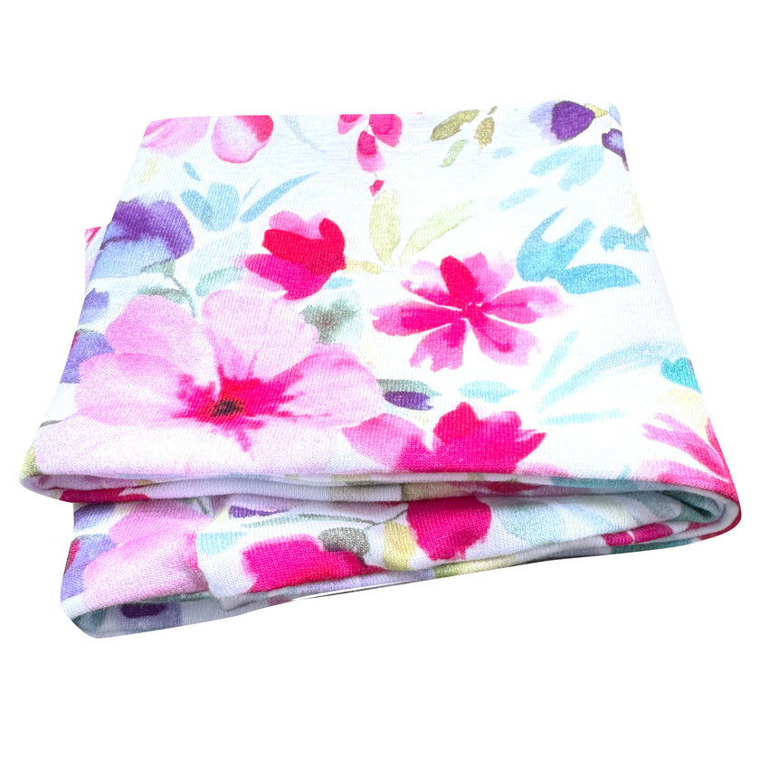 Wollhuhn Elastisches Öko Stirnband / Haarband Jersey Zweilagig Breit Blumen Pink/Bunt, gefaltet, mit floralem Muster, handgemacht aus weichem, zertifiziertem Bio-Jersey.