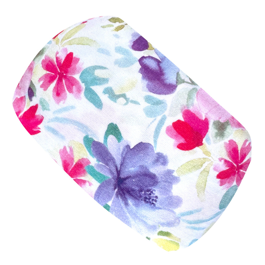 Wollhuhn Elastisches Öko Stirnband, zweilagig, mit Blumenmotiv, handgemacht in Deutschland. Nahaufnahme zeigt weiches Jersey-Material, ideal für Freizeit und Sport.