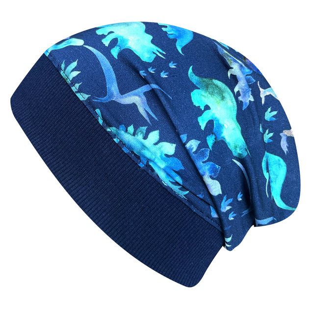 Wollhuhn Dünne Öko Beanie-Mütze Sommer/Übergang Einlagig Dinos Blau, handgemachte, bequeme Jersey-Mütze mit blauen Dinosauriermotiven, ideal für kühle Tage.
