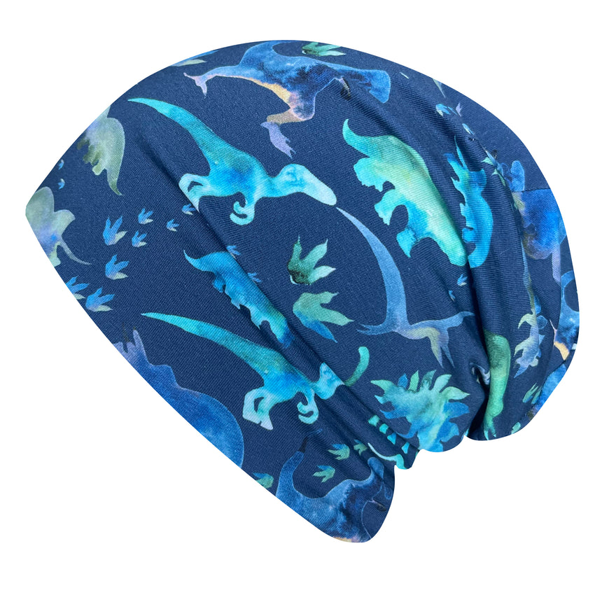 Wollhuhn Öko Long Beanie/Wendemütze: Blaue Beanie mit Dinosauriermotiven, zweilagig aus weichem Baumwolljersey, ideal für Kinder.