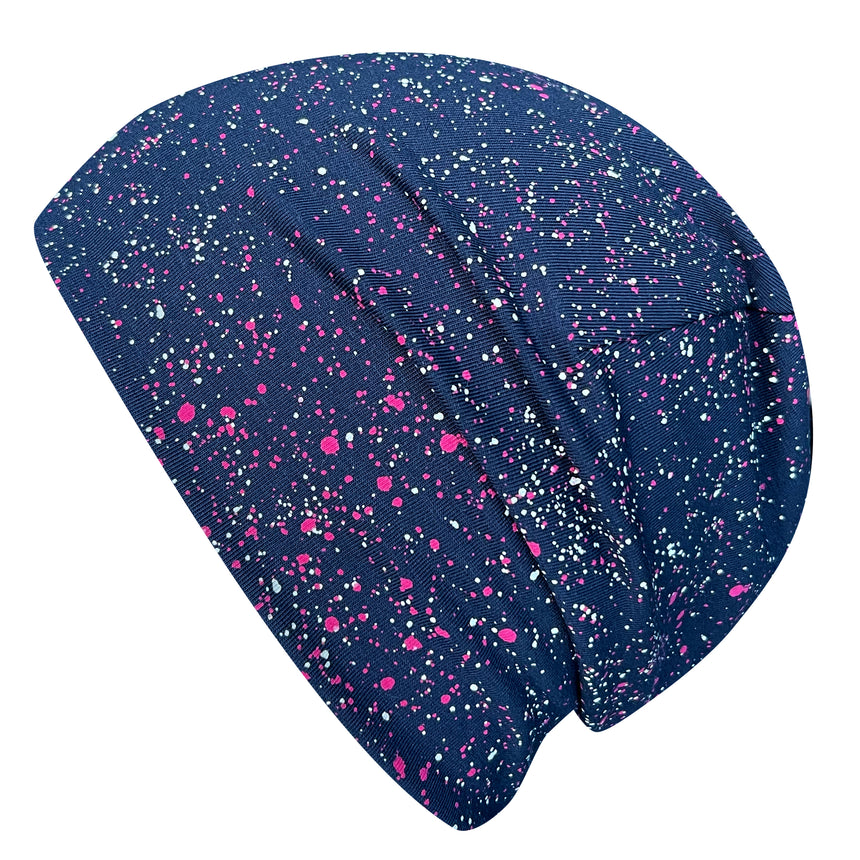 Wollhuhn Öko Shorties Wendemütze: Handgefertigte blaue Beanie mit pink-weißen Sprenkeln, zweilagig und wendbar, ideal für aktive Kinder und Jugendliche.