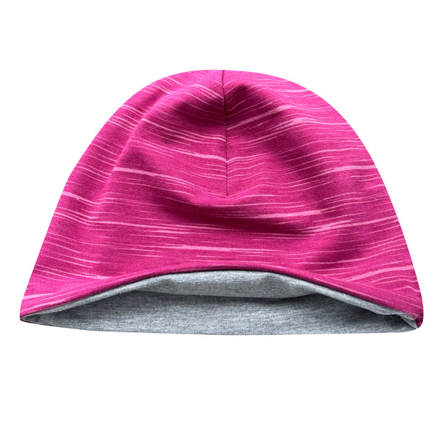 Wollhuhn Öko Shorties: Handgemachte, zweilagige Beanie aus Öko-Jersey, mit grauer Innenseite, ideal für aktive Kinder, bequem, warm und wendbar.