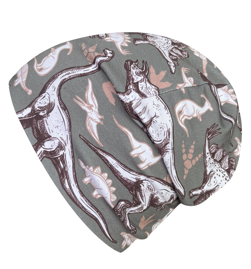 Wollhuhn Öko Shorties: Handgemachte Wendemütze mit Dinosaurier-Muster, zweilagig, ideal für Kinder, mitwachsend, aus weichem Öko-Jersey, perfekter Sitz unter Helmen.