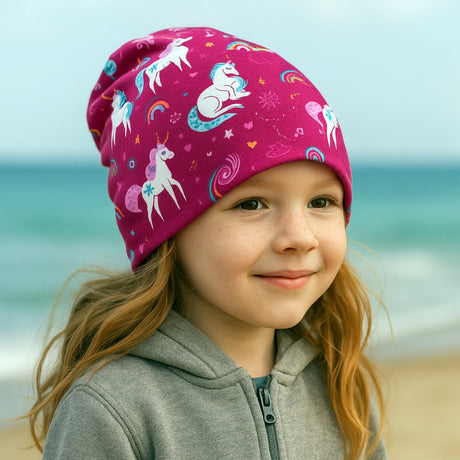Wollhuhn Öko Shorties: Handgemachte, zweilagige Wendemütze aus weichem Öko-Jersey, kürzerer Schnitt, ideal für aktive Kinder, mitwachsend und unter Helmen tragbar.