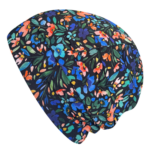 Wollhuhn Öko Shorties: Handgemachte Wendemütze, zweilagig, mit buntem Blumenmuster. Perfekt für aktive Kinder, stylisch und komfortabel.