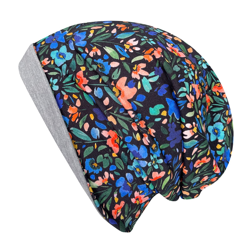 Wollhuhn Öko Long Beanie / Wendemütze, zweilagig, mit buntem Blumenmuster, weich und dehnbar, ideal für Kinder, handgefertigt aus ökologischem Jersey.