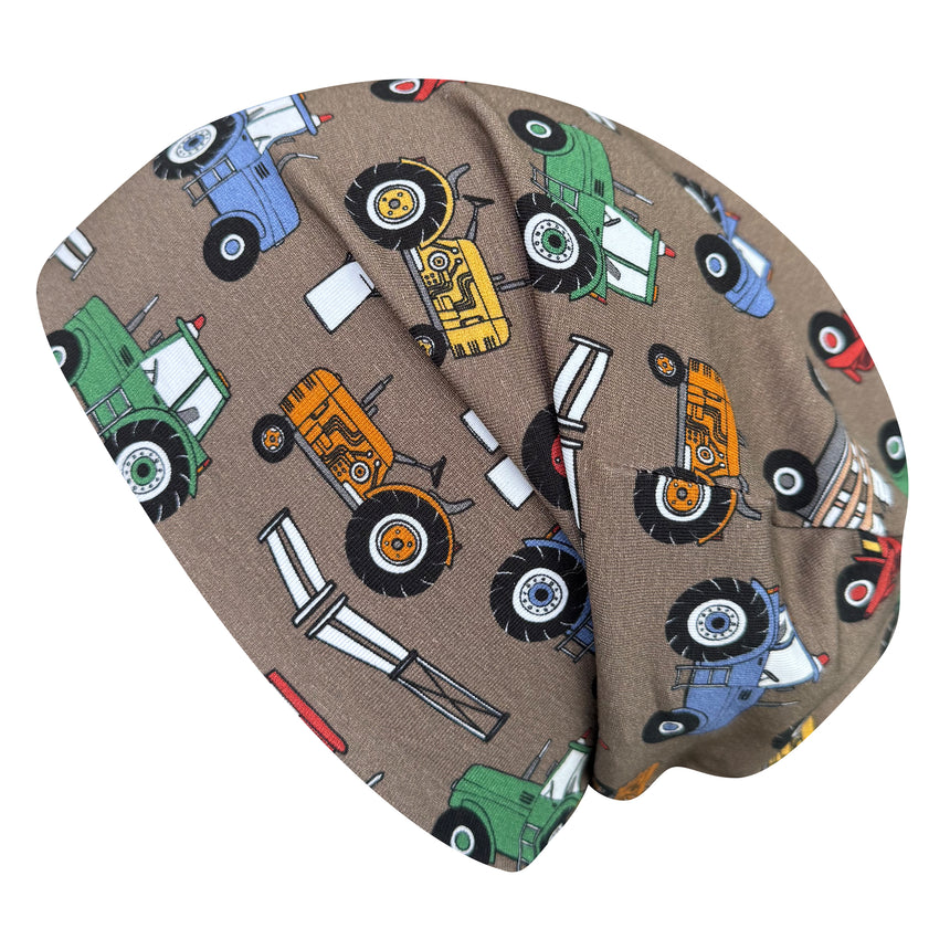 Wollhuhn Öko Long Beanie / Wendemütze mit Traktor-Muster, zweilagig und weich, ideal für Kinder. Handgefertigt aus Öko-Jersey, langlebig und komfortabel.