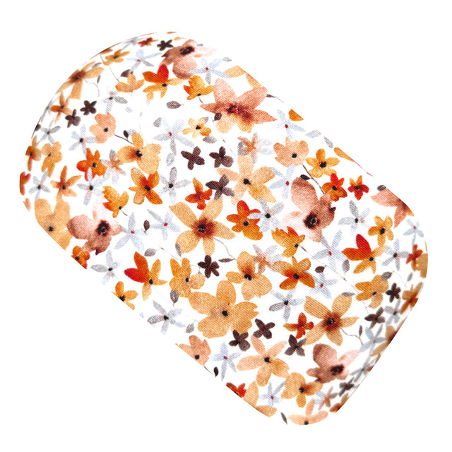 Wollhuhn Elastisches Öko Stirnband, zweilagig, zeigt ein florales Muster, ideal für Schule und Sport. Handgefertigt, dehnbar und bequem aus Bio-Baumwolle.