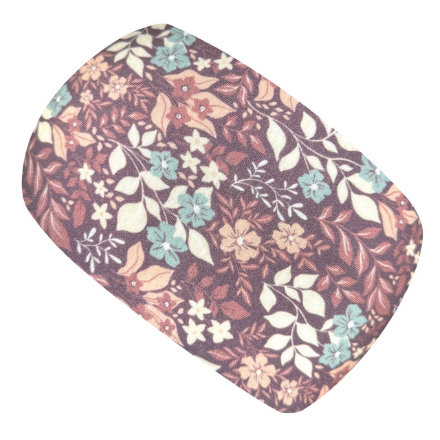 Wollhuhn Elastisches Öko Stirnband mit Blumenmuster, handgemacht aus Bio-Baumwolle, zeigt Detailansicht der weichen, doppellagigen Jersey-Struktur. Ideal für vielseitigen Einsatz.