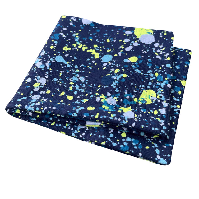 Wollhuhn Elastisches Öko Stirnband: Handgemachtes, zweilagiges Jersey-Stirnband mit blau-gelbem Sprenkelmuster, ideal für Sport und Freizeit, hautfreundlich und dehnbar.