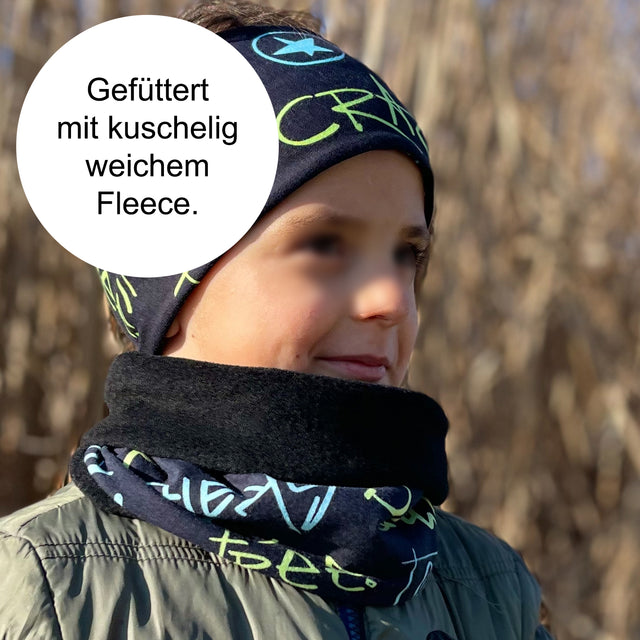 Kind trägt Wollhuhn Halstuch/Schlupfschal/Loop WARM mit Fleecefutter, ideal für kalte Tage, handgefertigt in Deutschland, bequem über den Kopf zu ziehen.