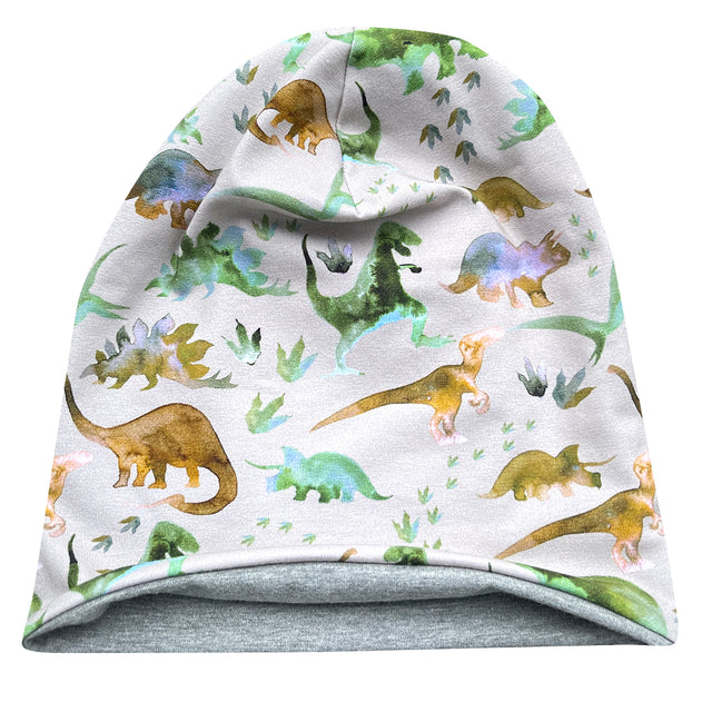 Wollhuhn Öko Long Beanie mit Dinosaurier-Muster, aus weichem Baumwolljersey, zweilagig und wendbar, ideal für Kinder, handgefertigt in Deutschland.